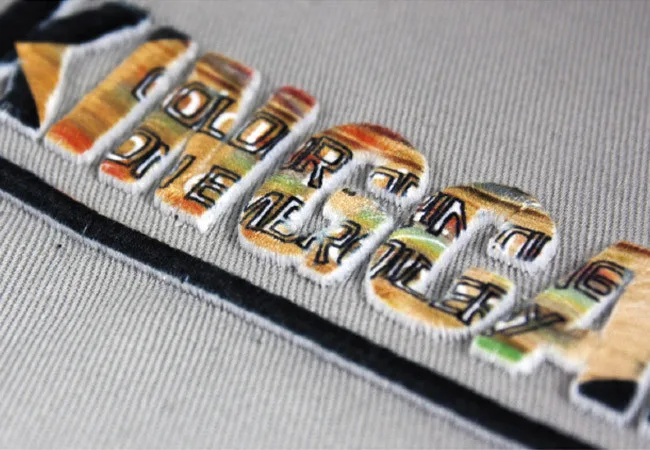 Stickerei mit Sublimationsdruck